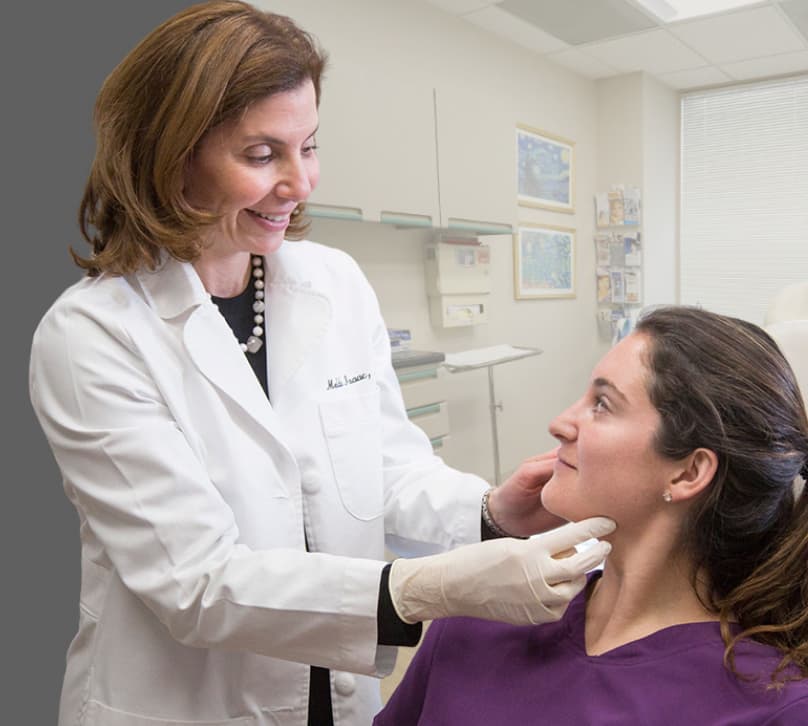 Dr. Isaac Working with patient