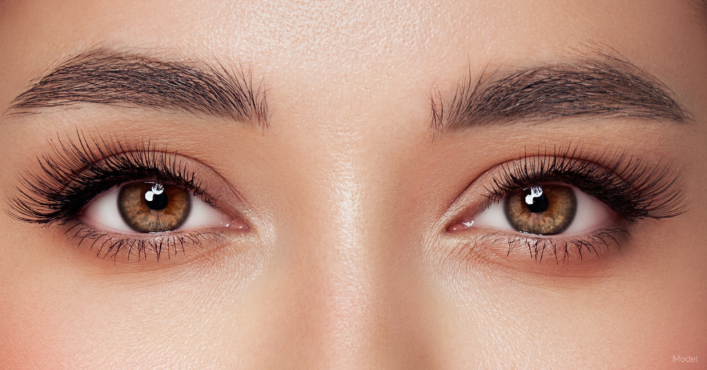 A close-up of a pair of brown eyes. (Model)
